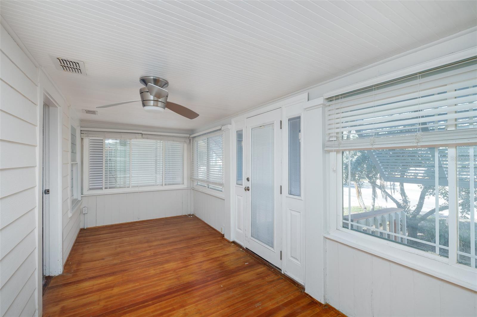 Light and bright den/office - Former front porch converted to living space (under heat & air)
