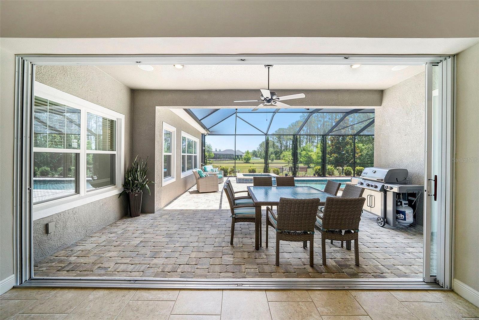 Pocket sliding glass doors looking onto the screened patio