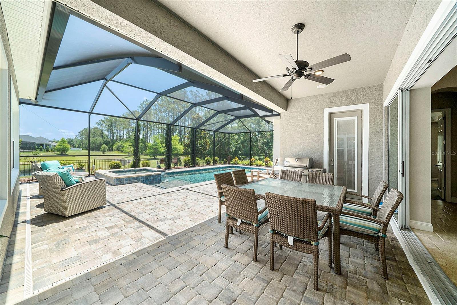 Back patio with pool and spa
