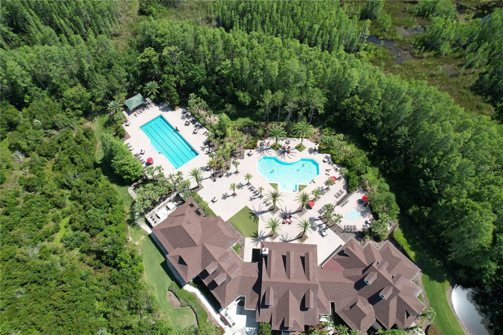 Community pool, lap pool, and clubhouse