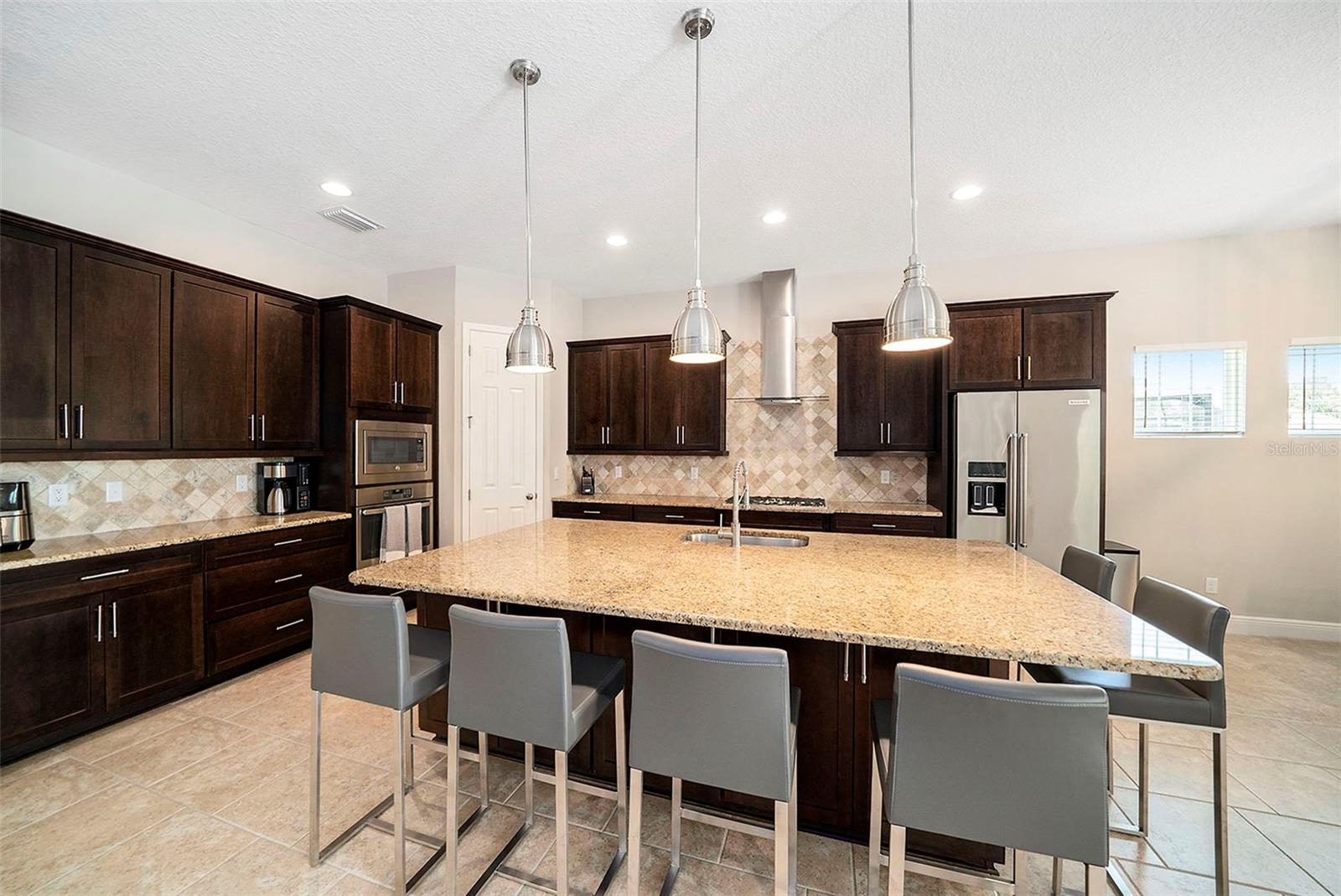 Oversized kitchen island with kitchen view