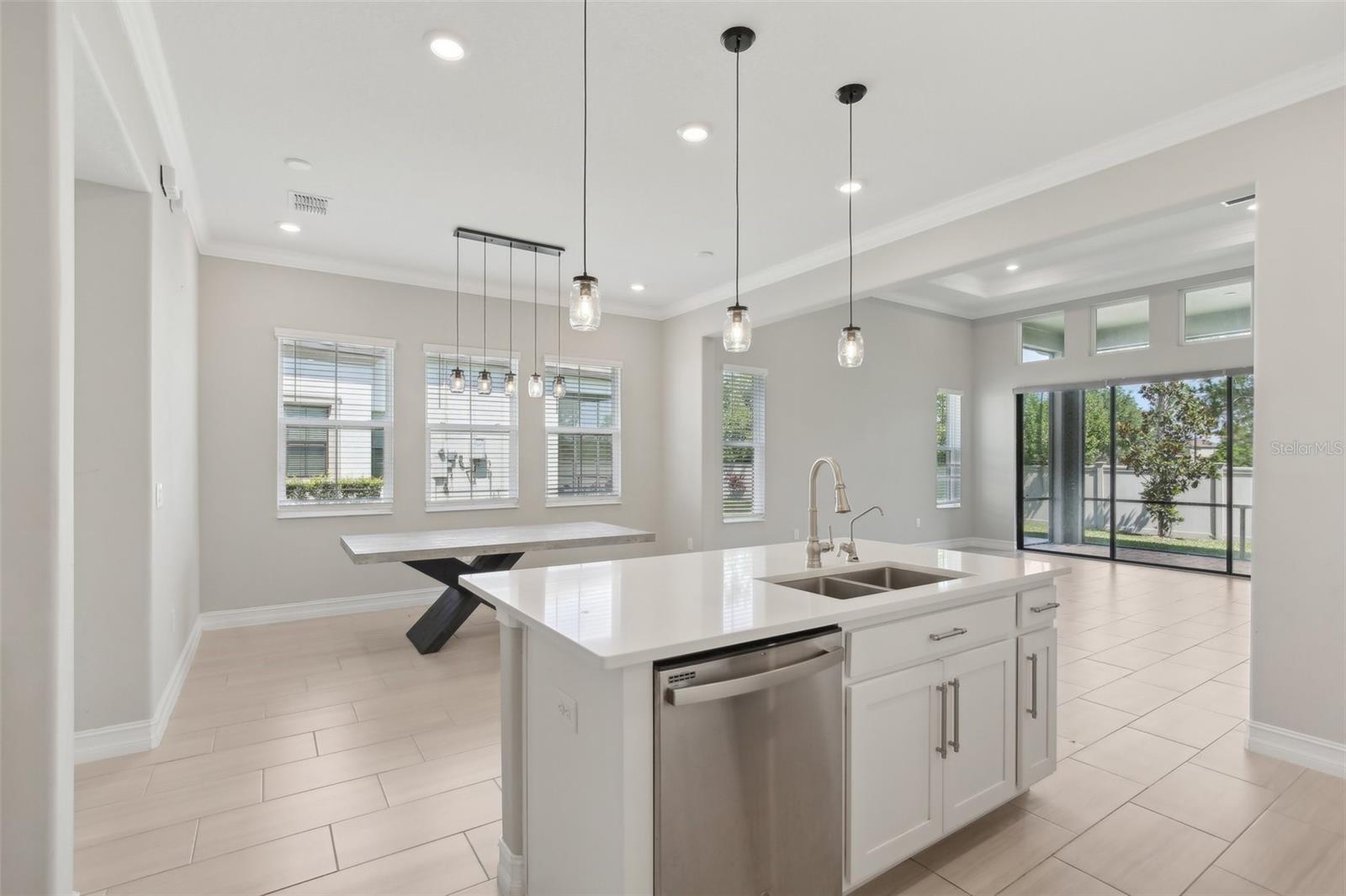 BRIGHT, OPEN KITCHEN LENDS TO PLENTY OF SPACE FOR ENTERTAINING