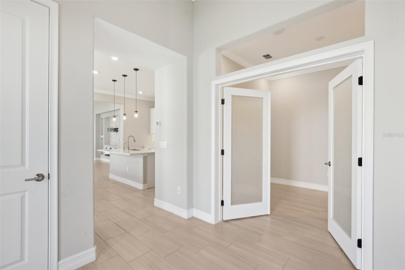 BEAUTIFUL OPEN FRONT ENTRY. DOUBLE DOORS LEAD TO OFFICE/DEN