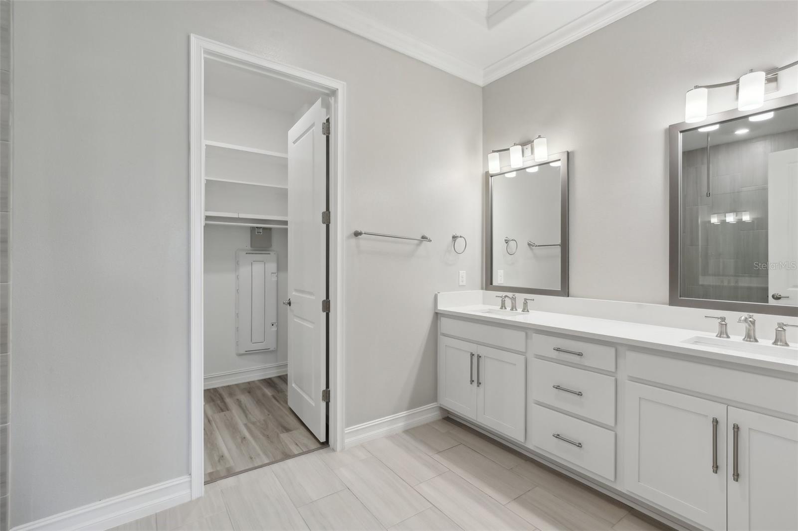 PRIMARY BATHROOM-DOUBLE SINK VANITY AND LARGE WALK-IN CLOSET