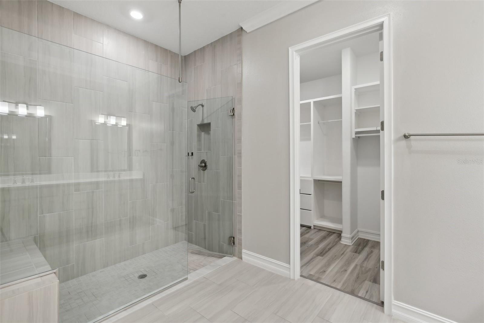 PRIMARY BATHROOM-HAS LARGE WALK-IN SHOWER WITH BUILT-IN SEATING