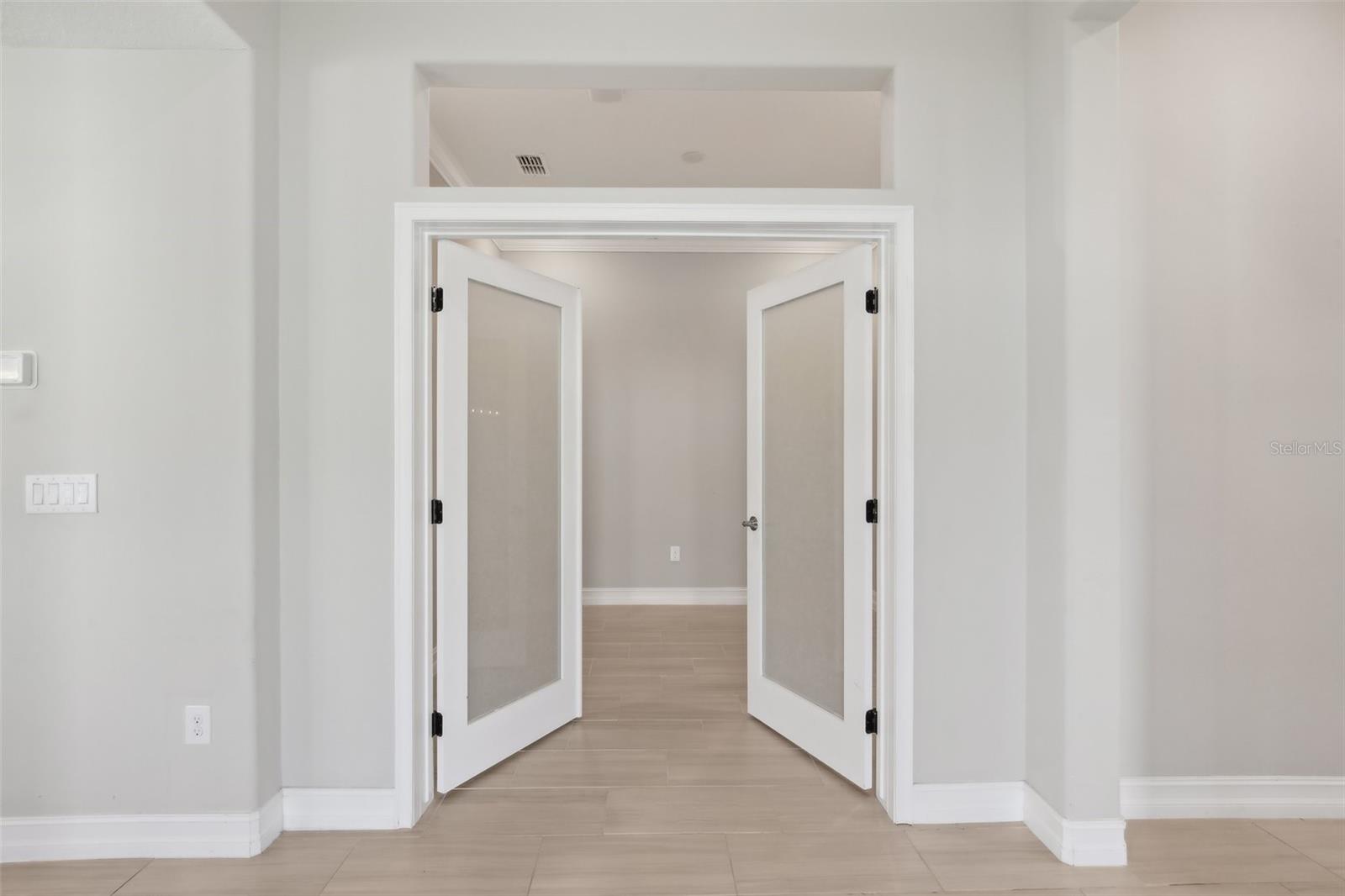BEAUTIFUL OPEN FRONT ENTRY. DOUBLE DOORS LEAD TO OFFICE/DEN