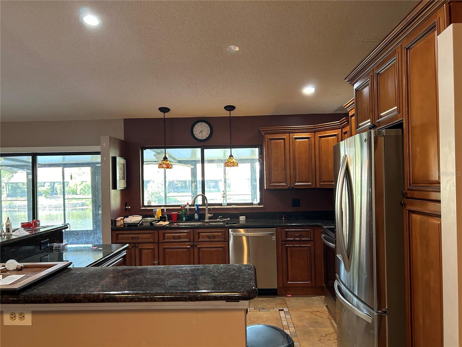 Solid wood cabinets and new appliances in Kitchen