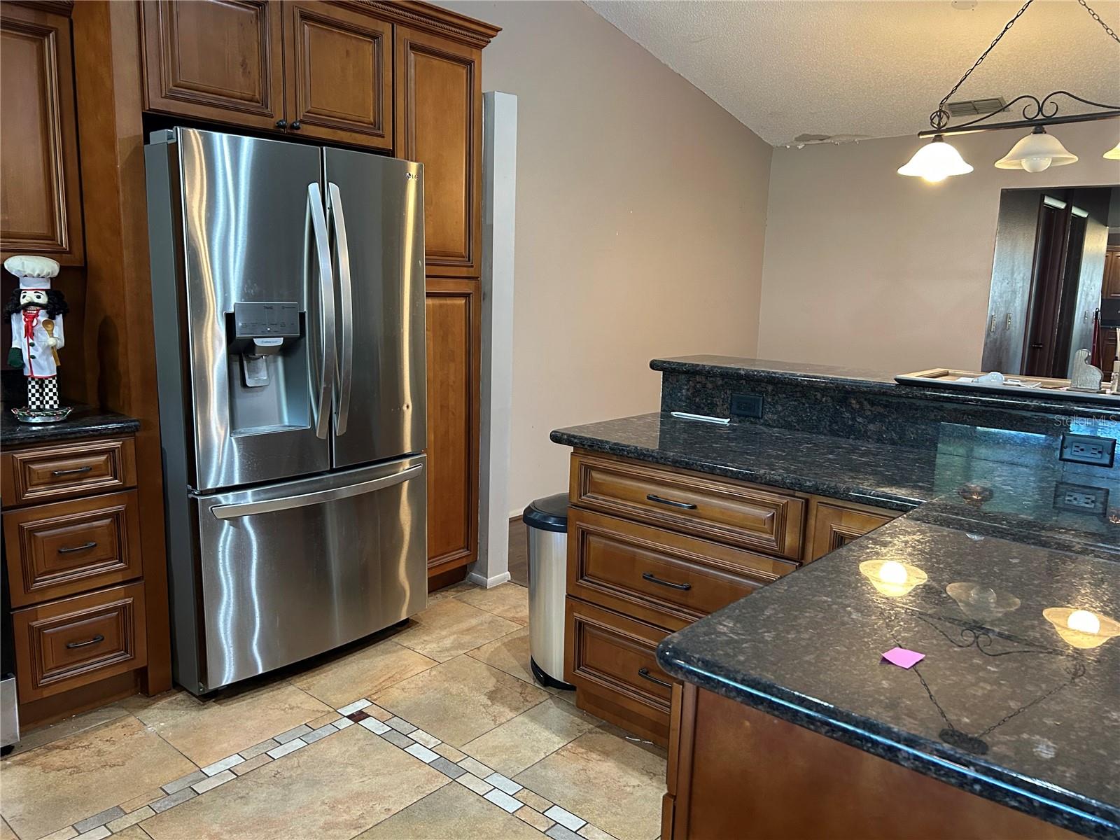 French door refrigerator/granite counter tops