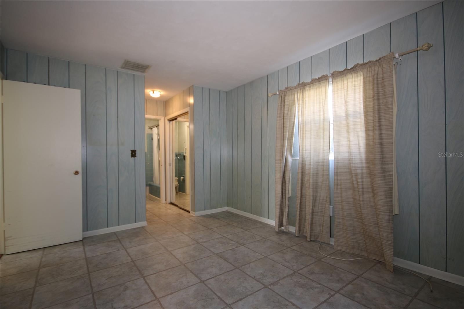 Bedroom 2 with view to ensuite bathroom