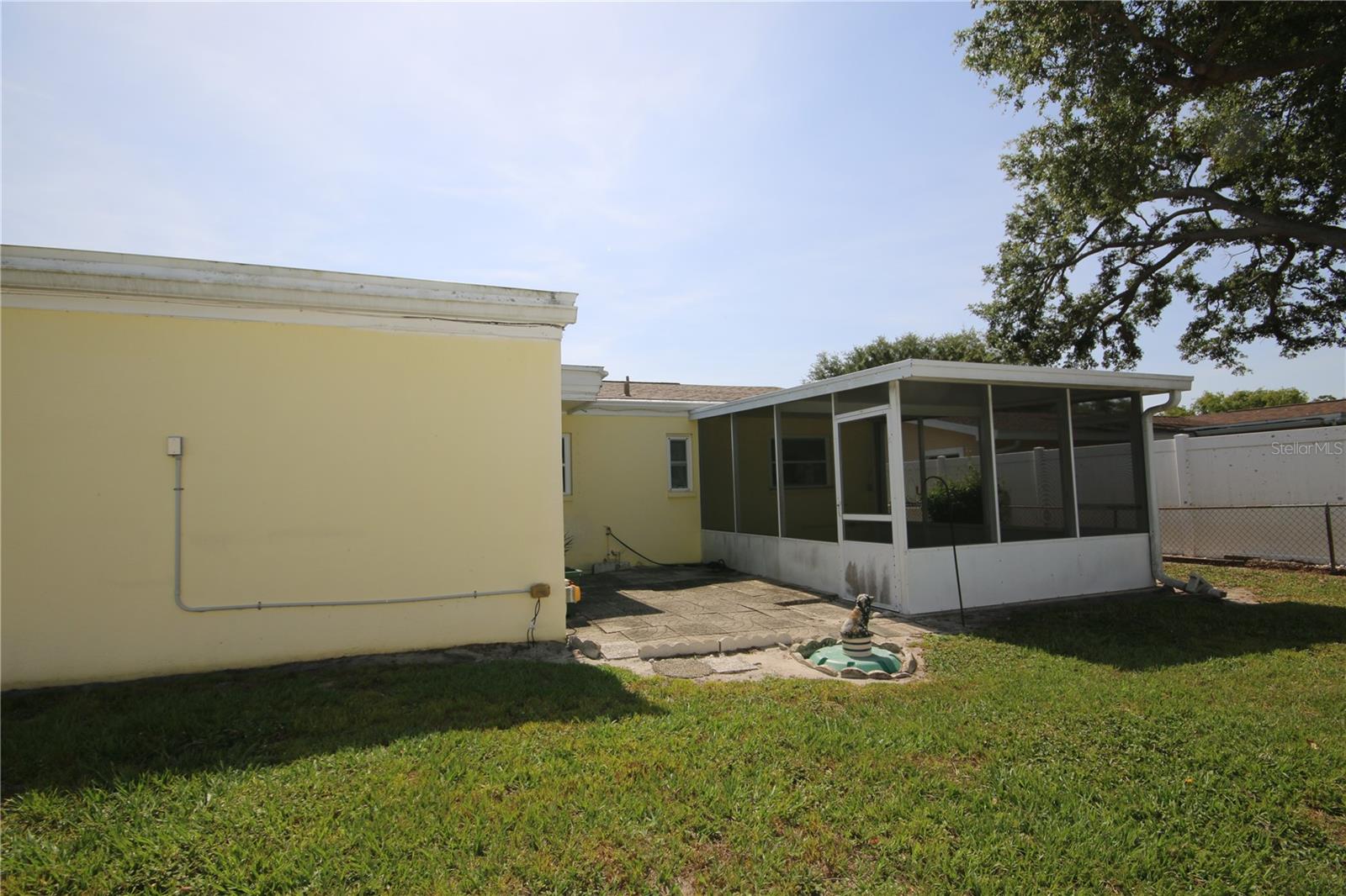 Back of Home showing open porch and Screen Enclosed Porch