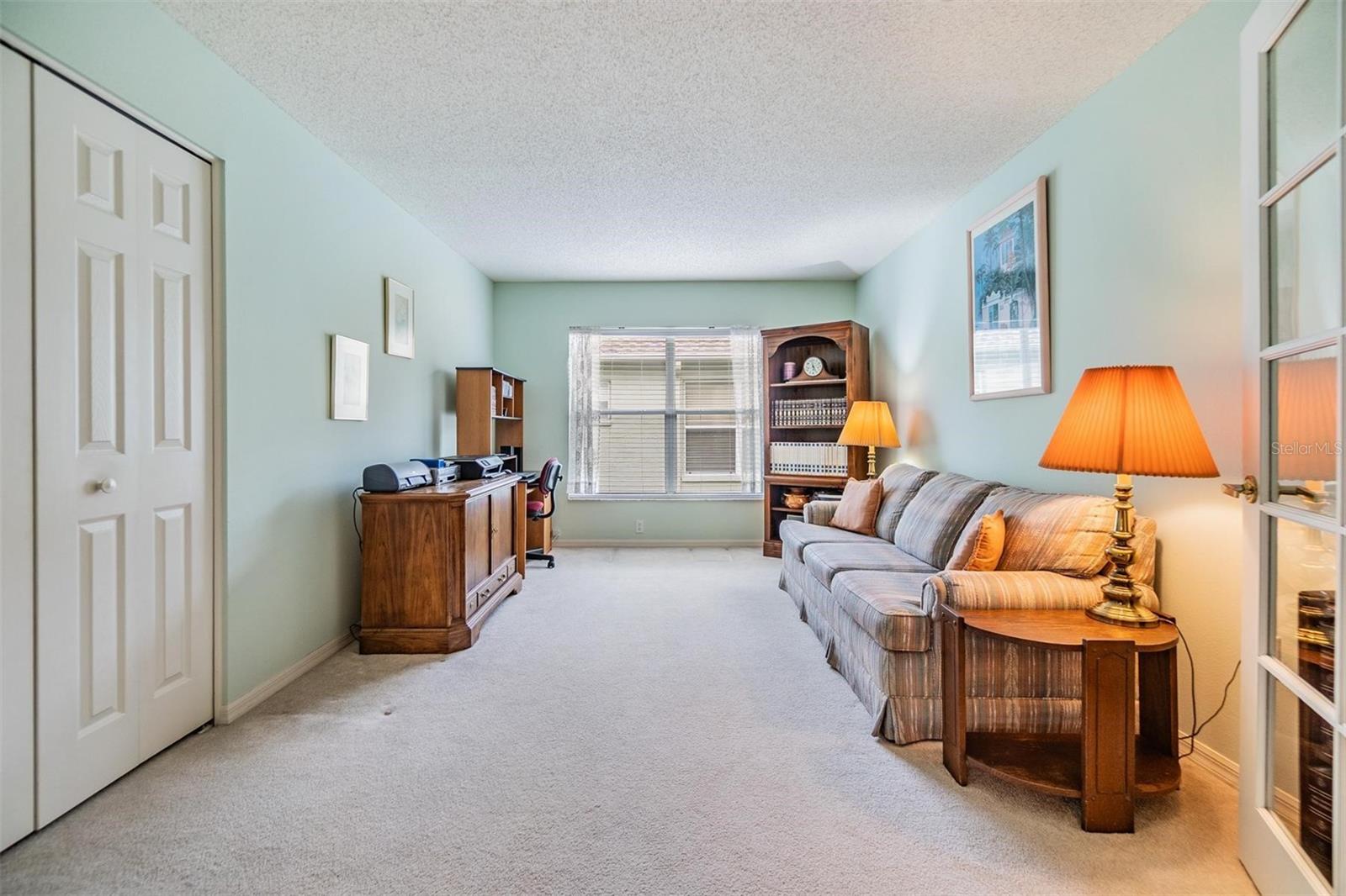 Den or 3rd bedroom, you choose - huge closet space and French doors