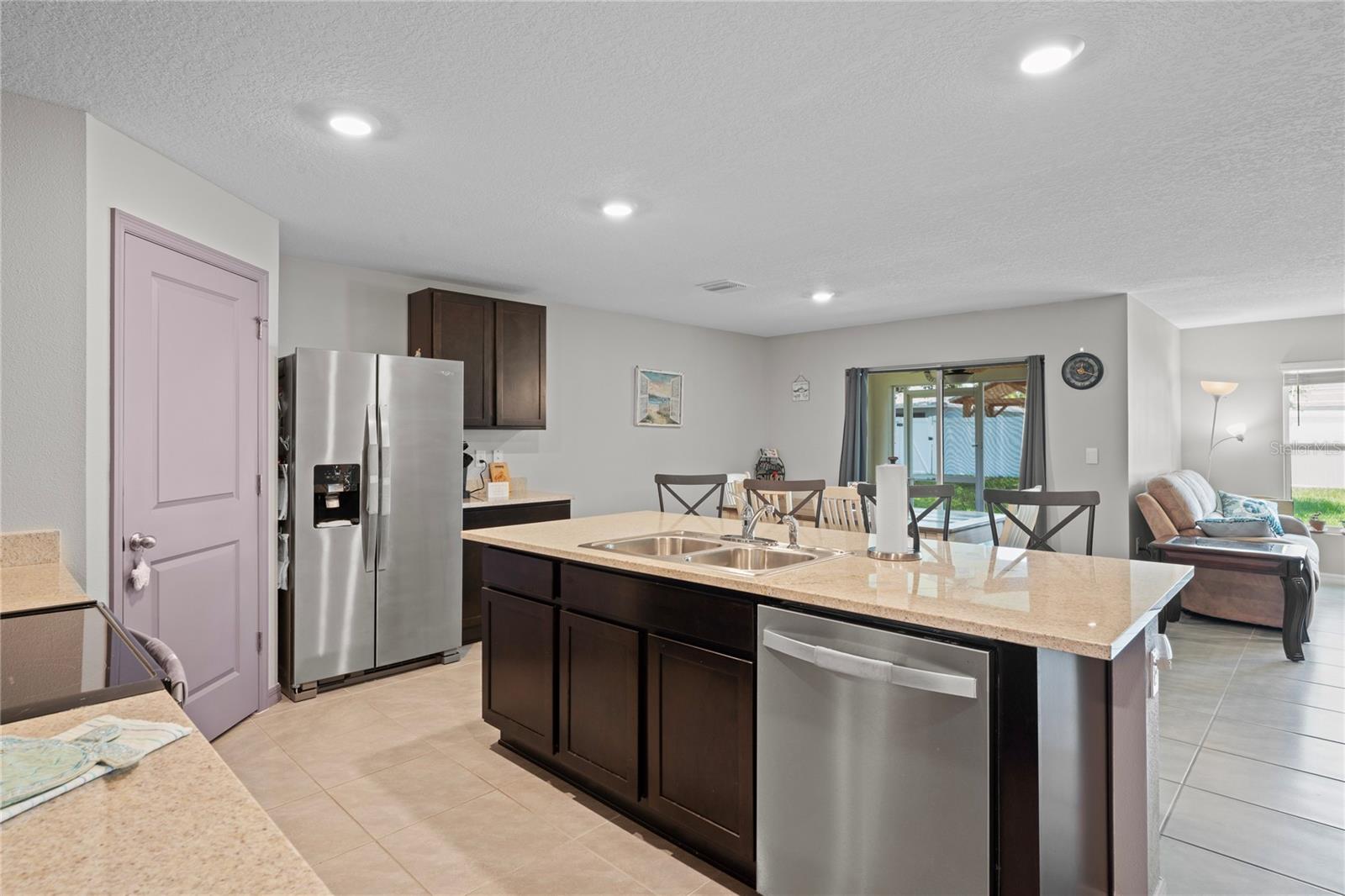 Kitchen, pantry door, dining, to lanai