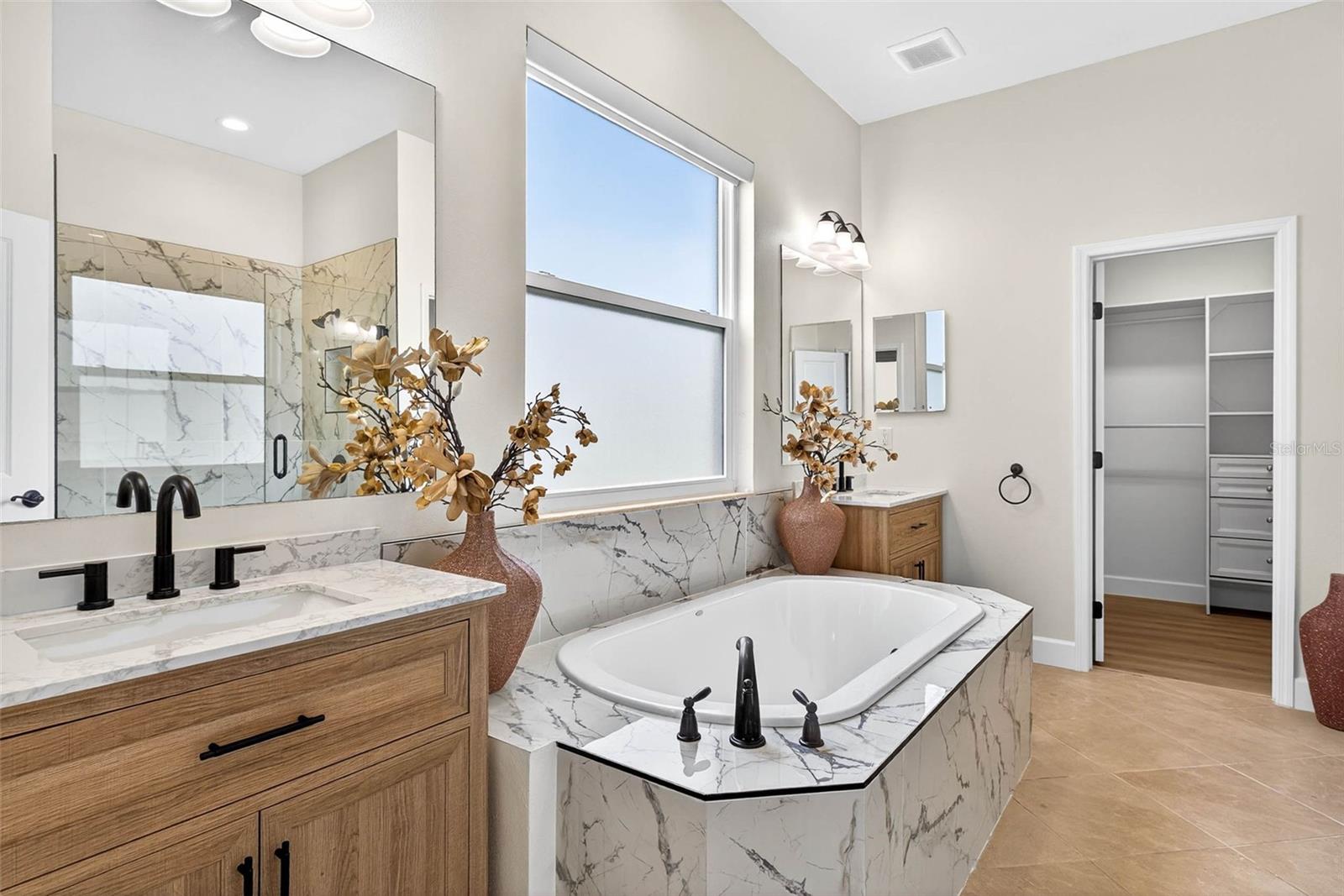 NEW tub, NEW walk in shower, built in custom closet
