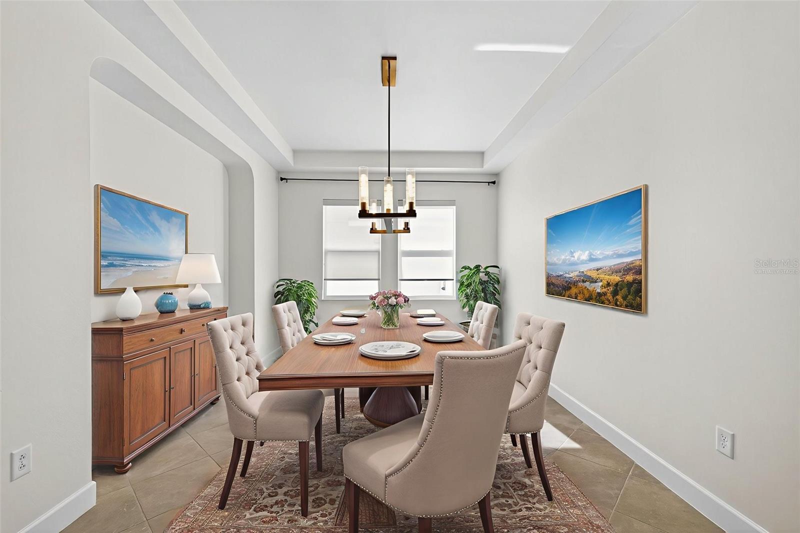 Dining room (virtually staged) Tray ceiling, space for a buffet, or use this room as a flex space for work/play/gym