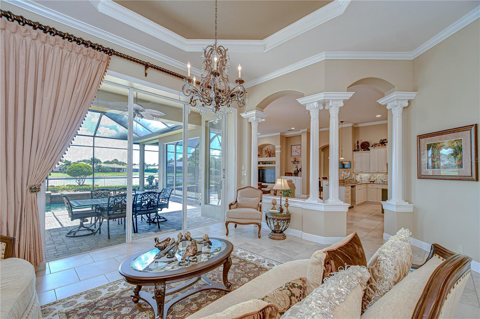 Triple Pocketing Sliders into the Wall from the Formal Living Room Combining Indoor/Outdoor Living