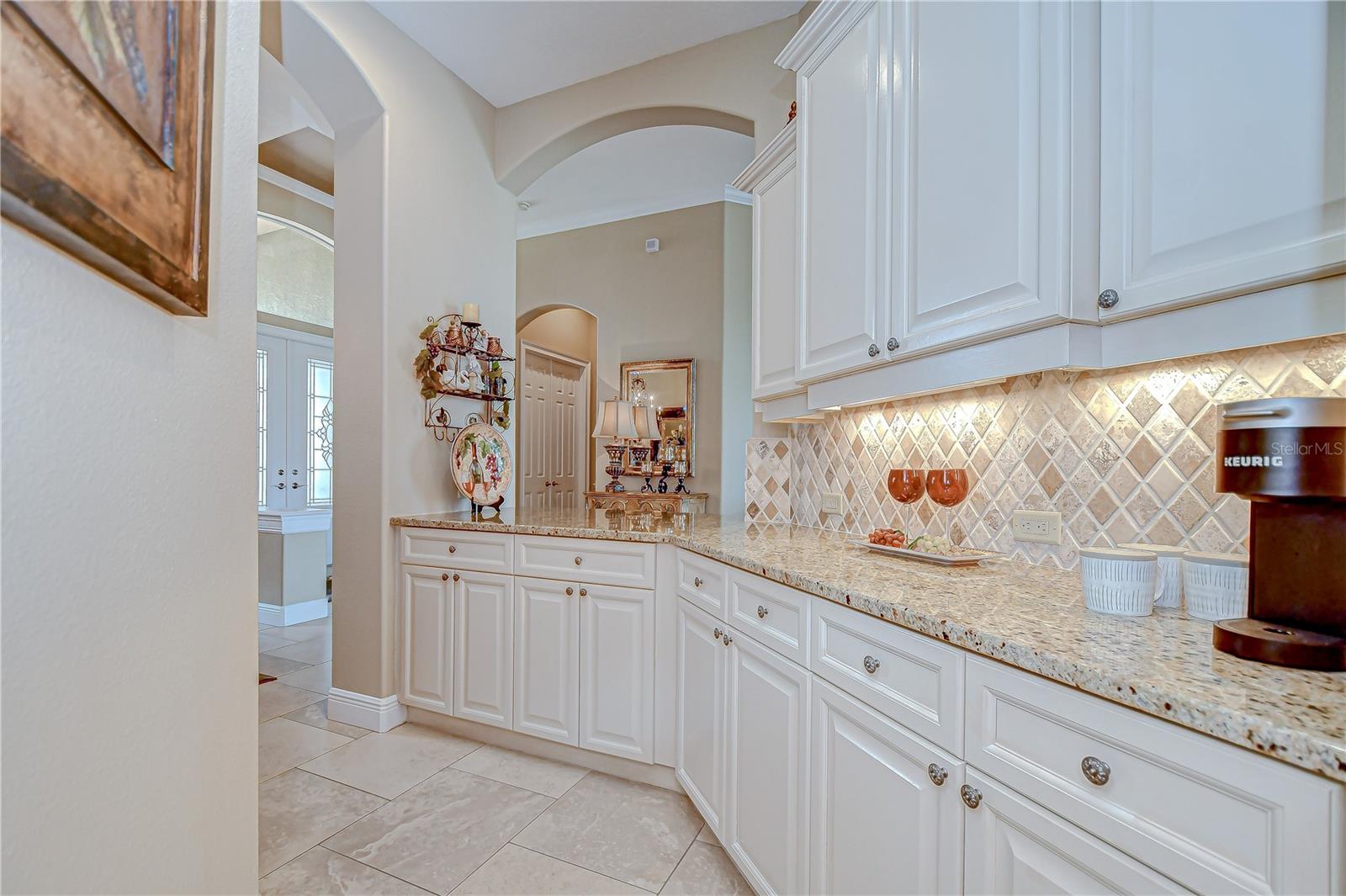 Butler's Pantry and Coffee Bar with Pass-Thru Granite Counter