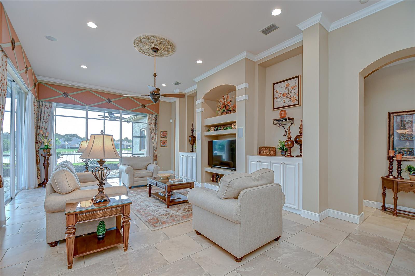 Family Room Displaying Entertainment Center