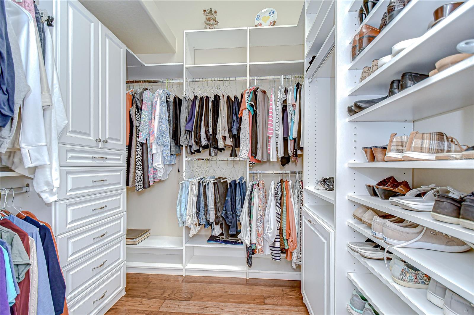 Two Custom Walk-in Closets with Shelves, Drawers, Hanging Space
