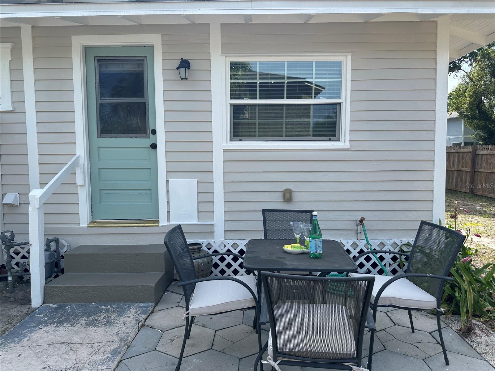 Step out of the kitchen to your spacious back yard!