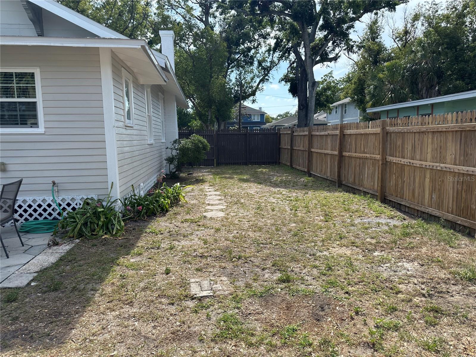 Side yard adds extra space to your back yard.