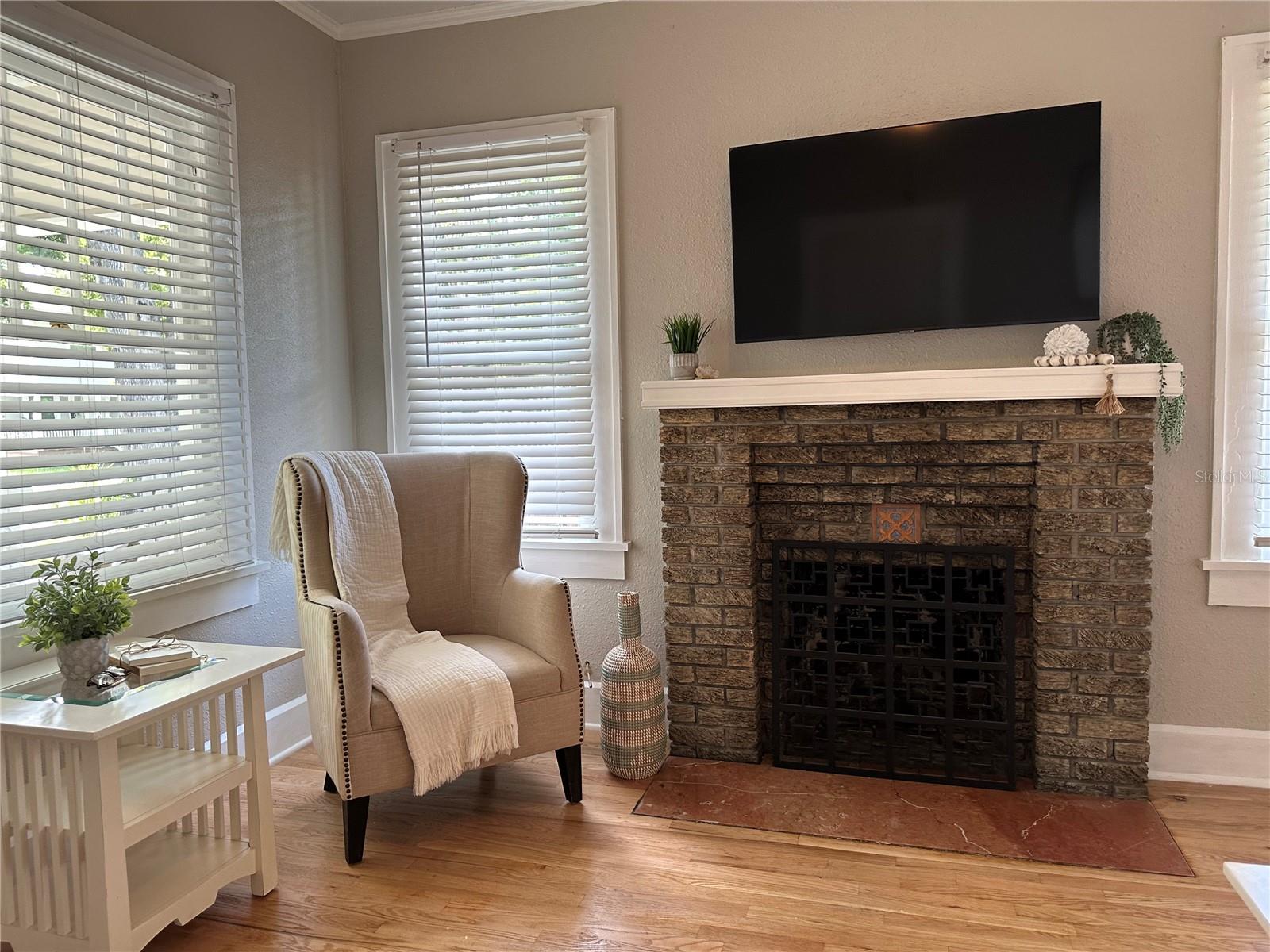 Elegant fireplace is a center point of the living room.