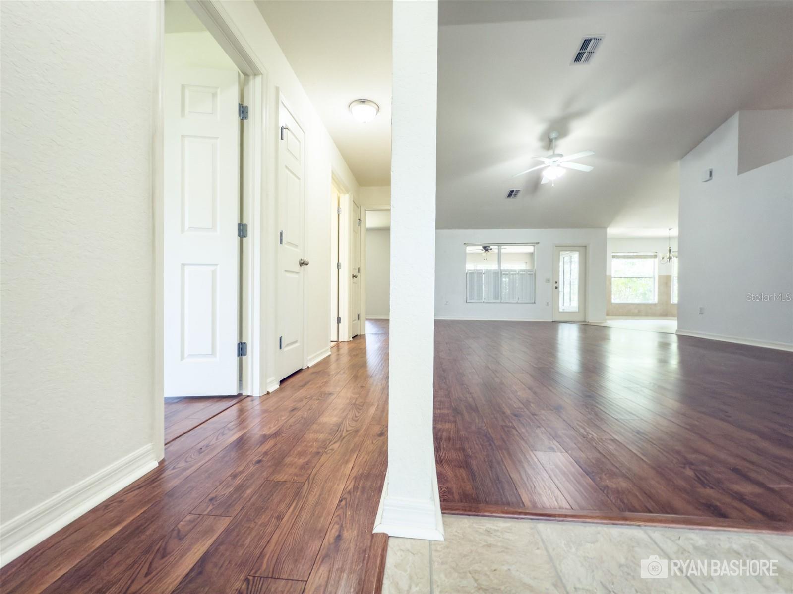 living room to the right hallway to all other bedrooms
