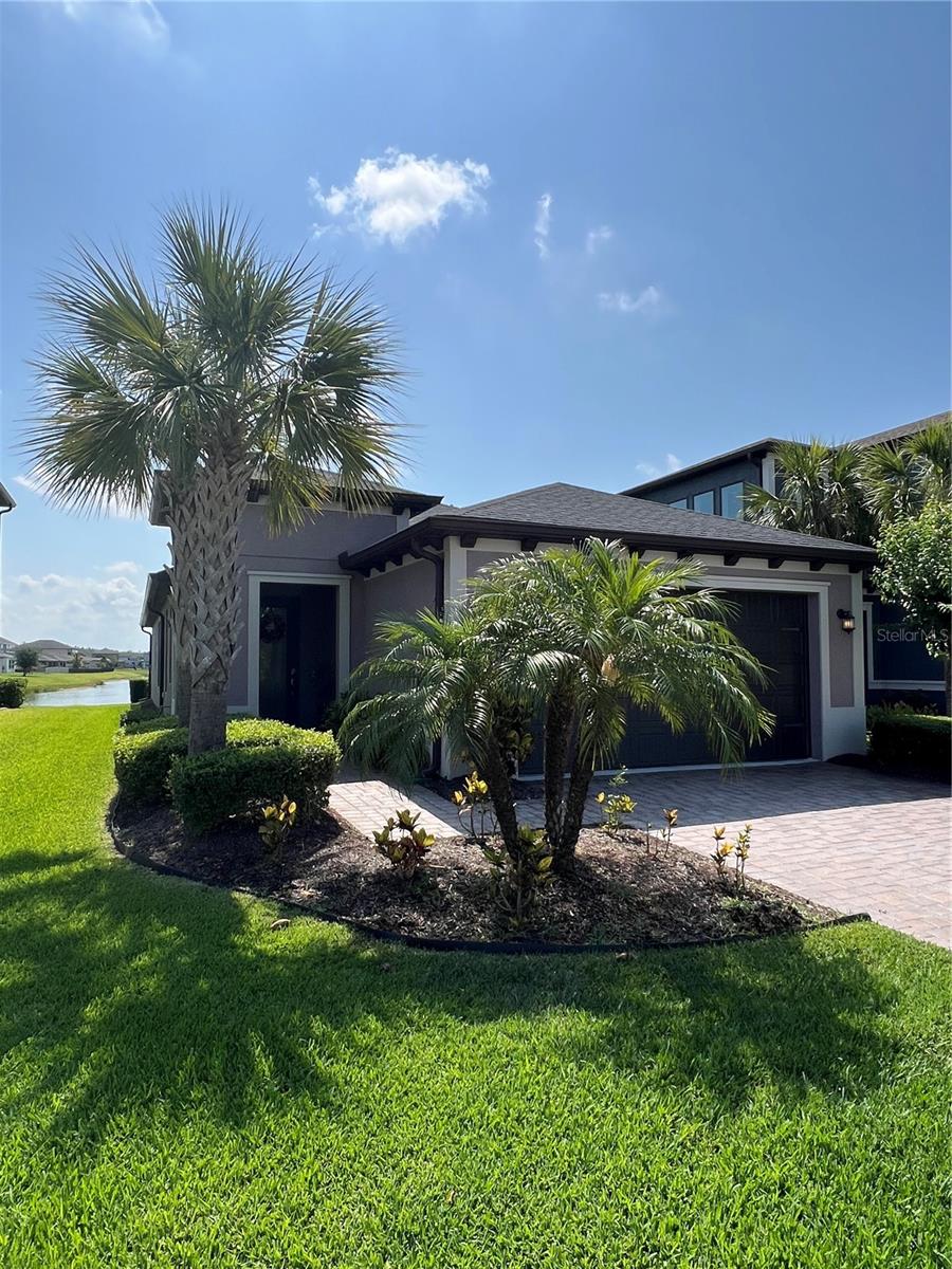 front entrance, pond in view