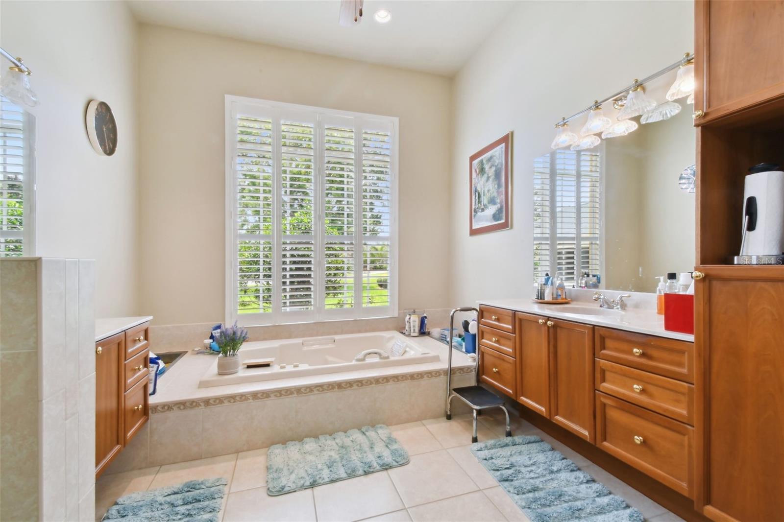 Master en-suite, with dual vanities, jetted tub and walk-in shower.