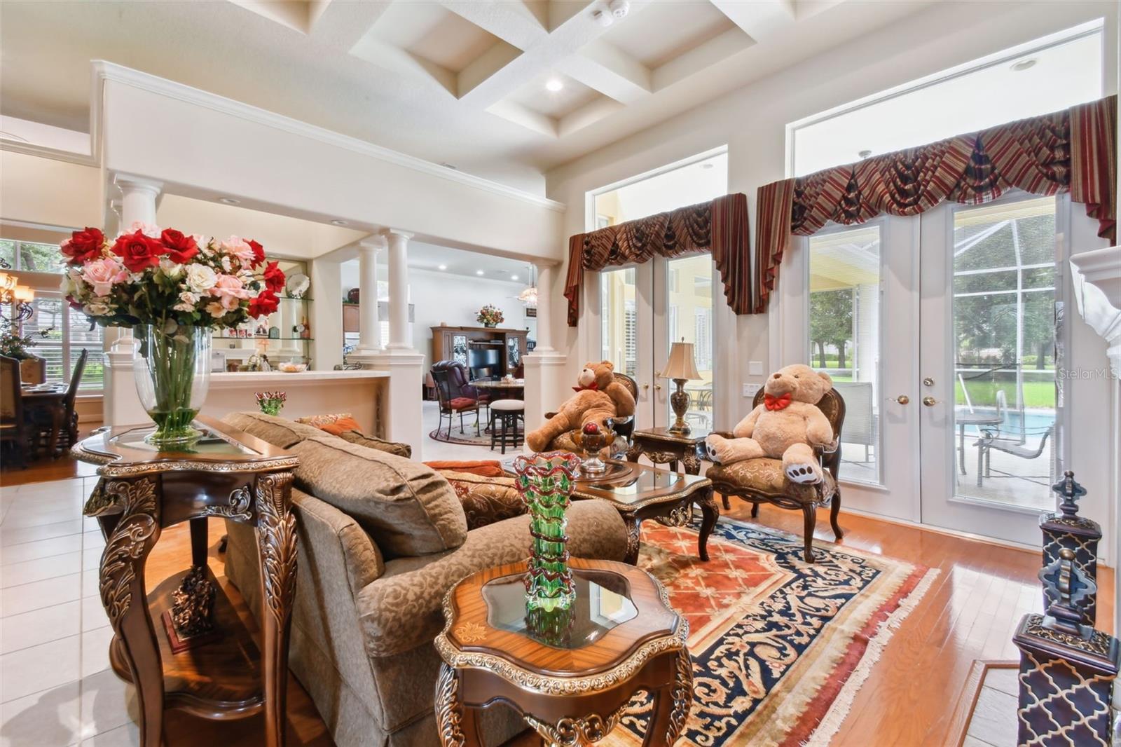 Family room with pool views.