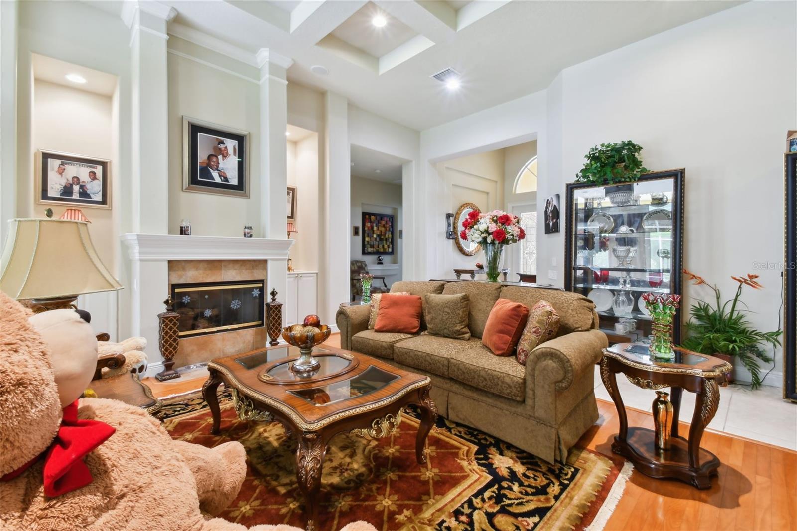 Family room with decorative tray ceiling.
