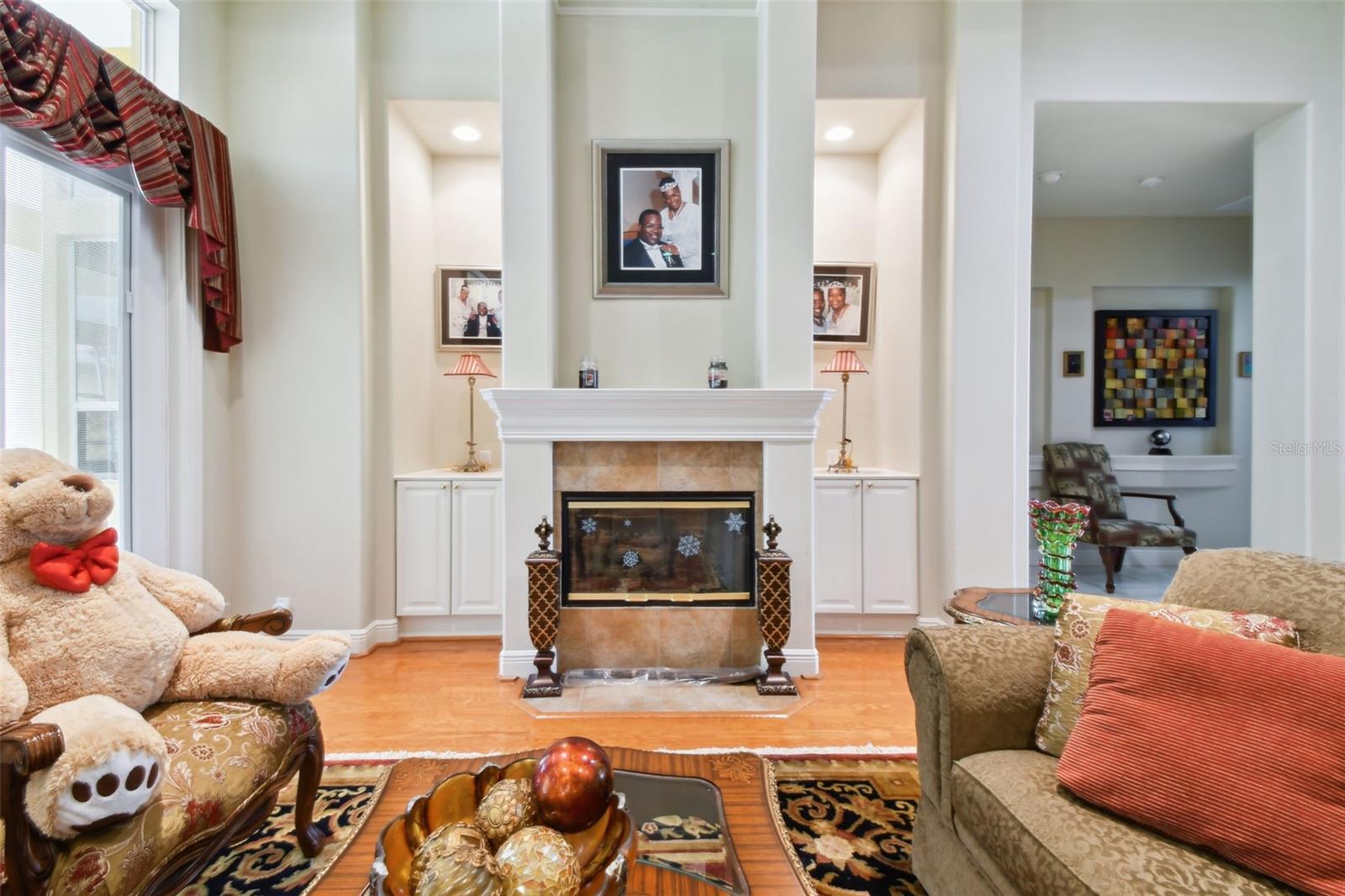 Family room with fireplace and built ins.