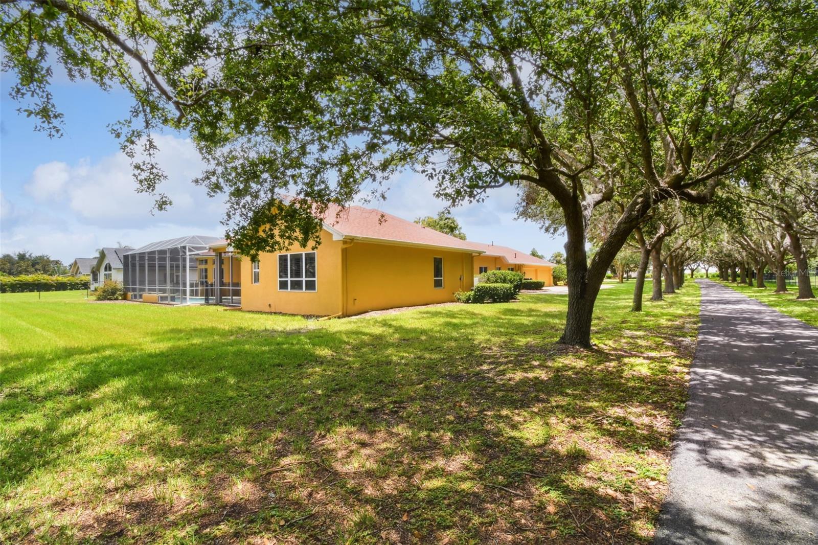 Rear view of the home and trail to your right.