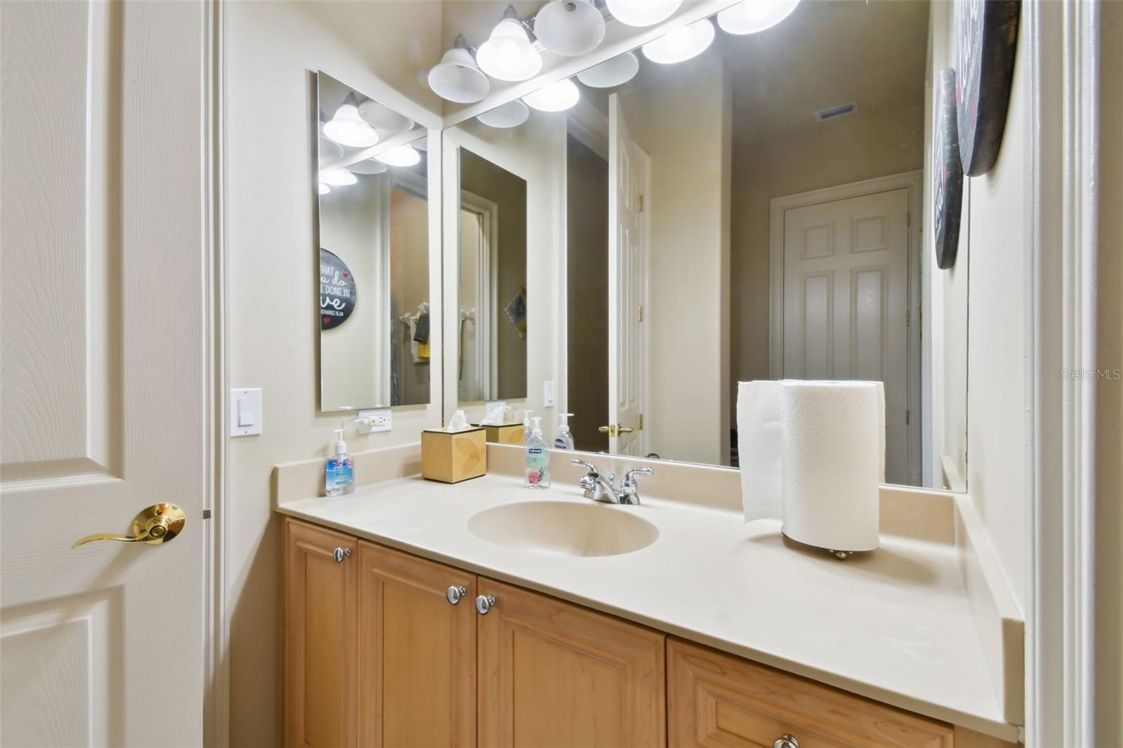 En-suite for bedroom 2. Single vanity and tub.