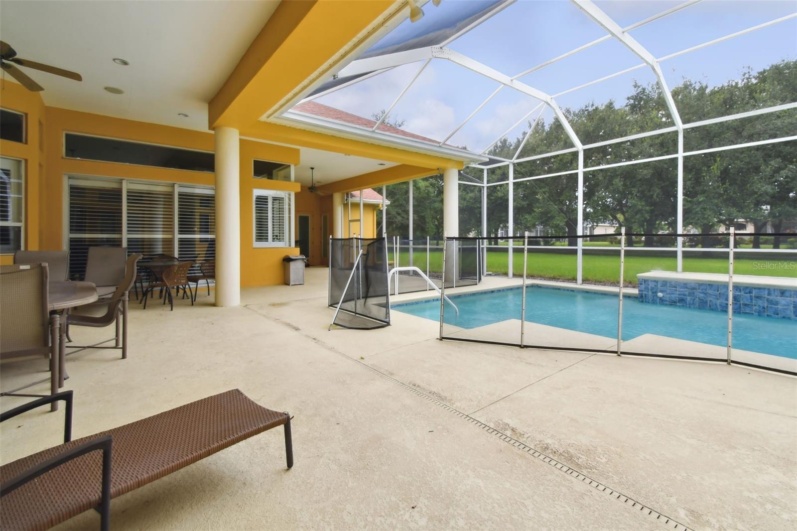 Relax and unwind on your covered lanai.