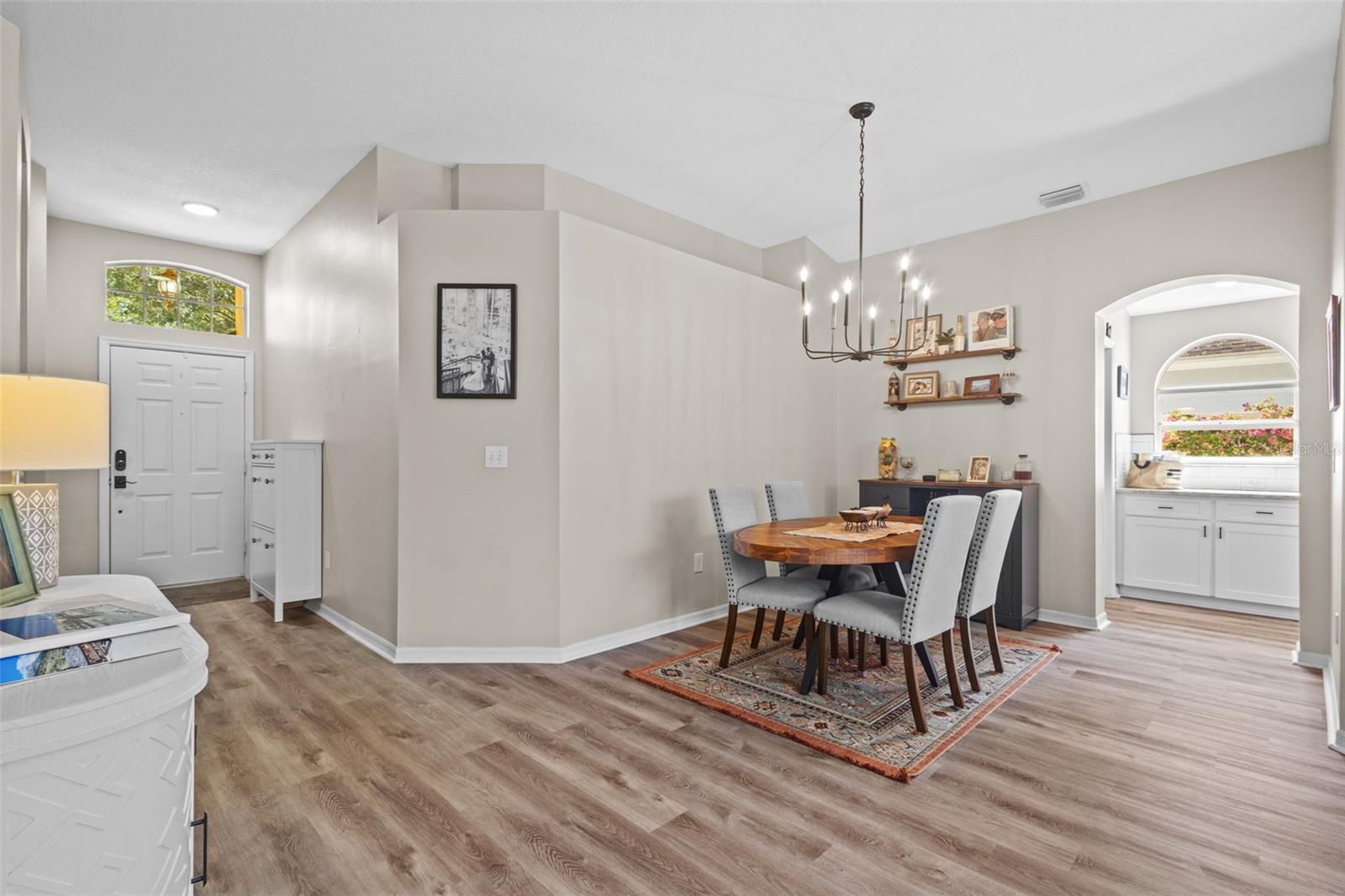 FOYER & DINING ROOM LEADING INTO KITCHEN