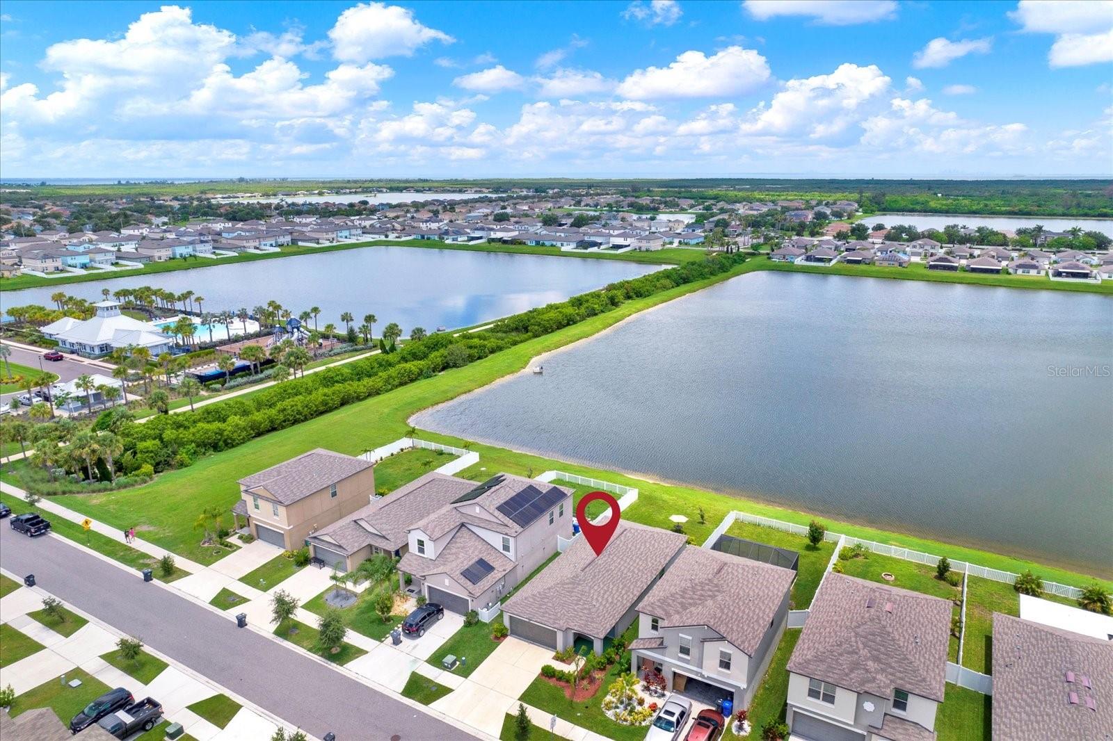 THREE HOMES FROM THE CLUBHOUSE AND POOL
