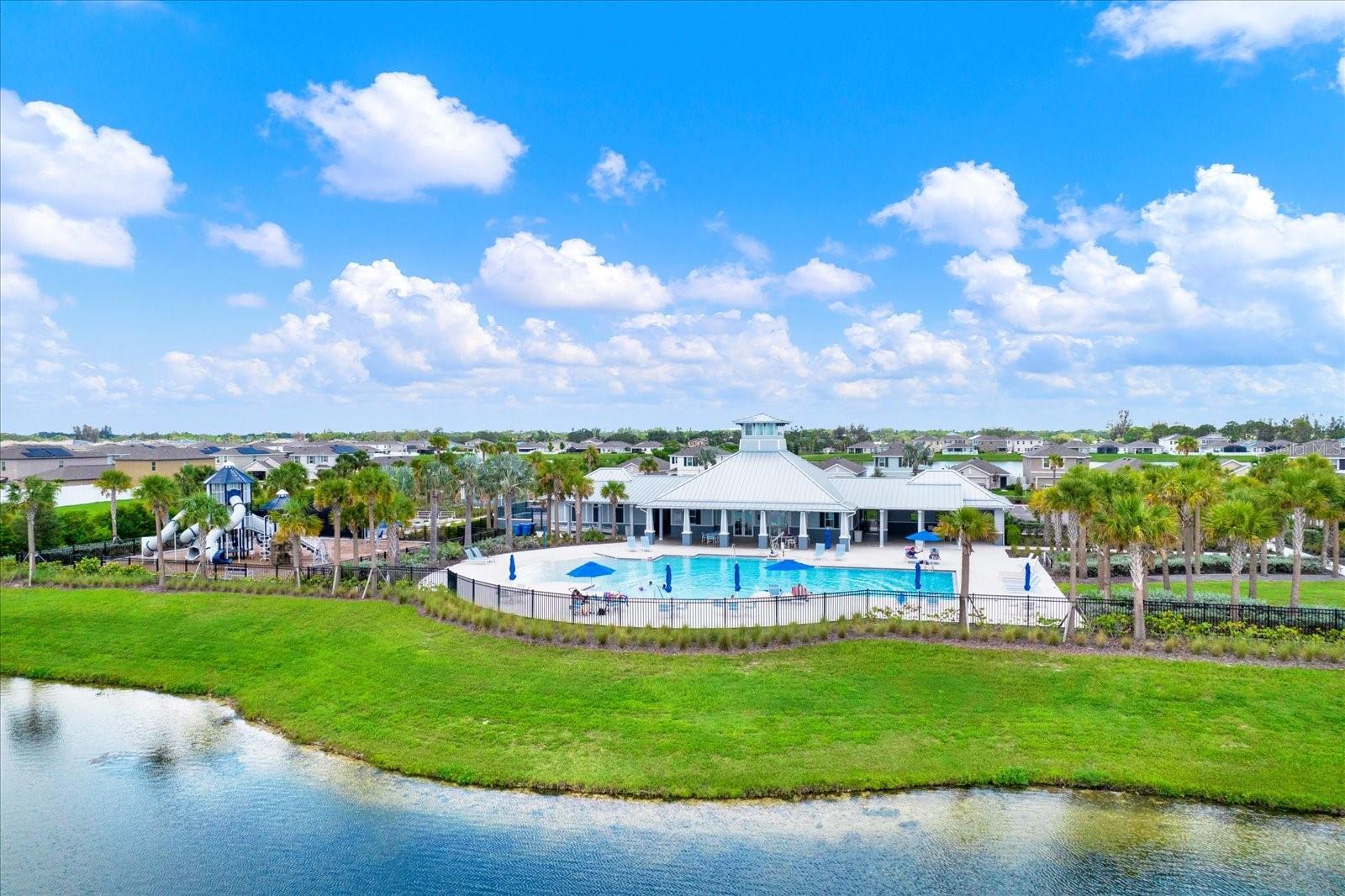 CLUB HOUSE AND POOL WITH WATER VIEWS