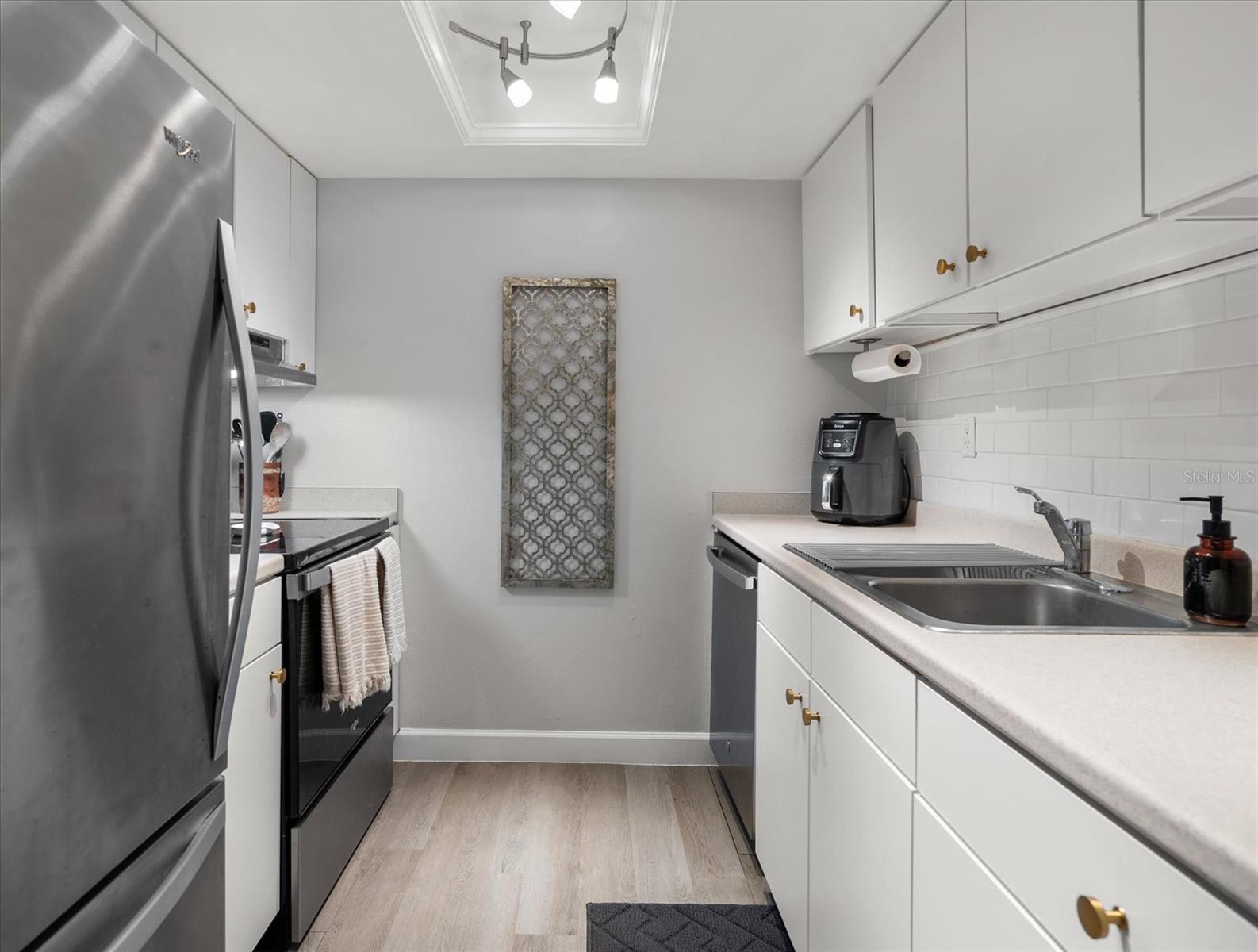 Well appointed kitchen area with all appliances within reach.