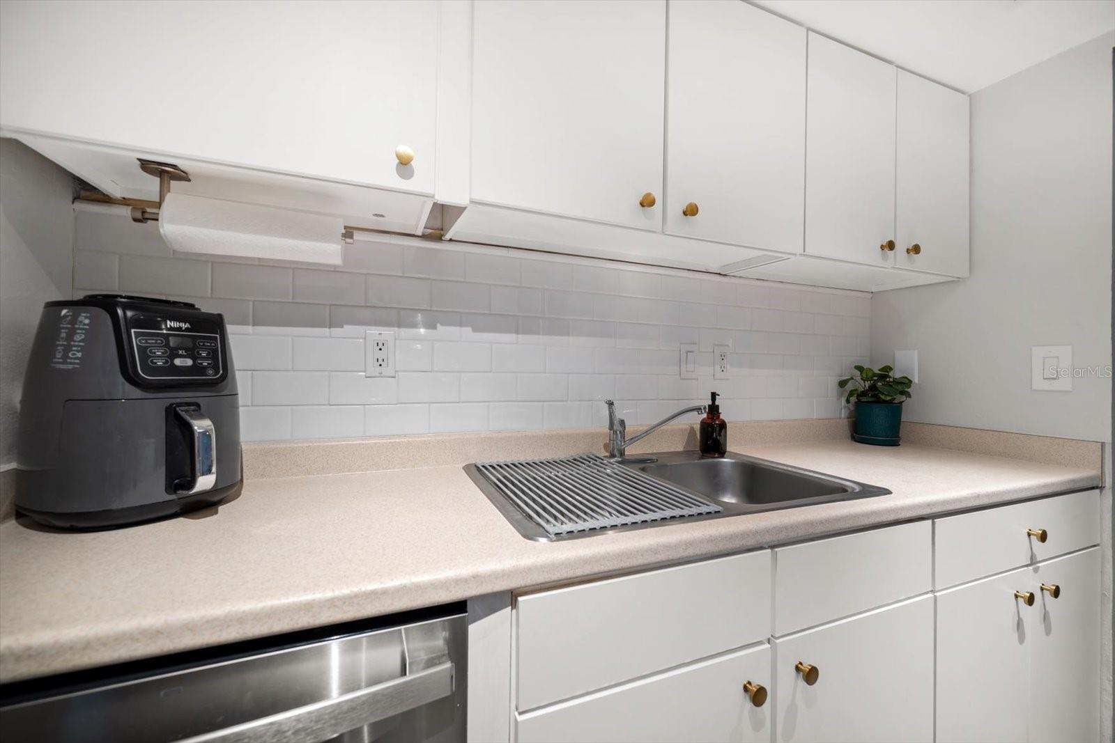 Ample storage and counter space found in the kitchen.