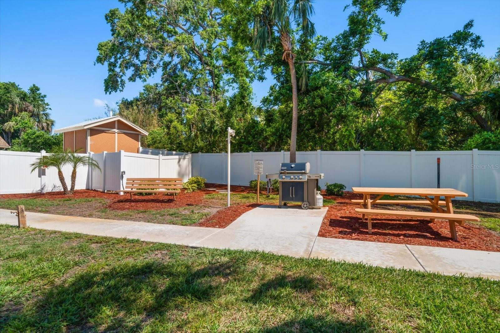 Enjoy cooking outdoors? There is a grill and picnic table right behind building 4.