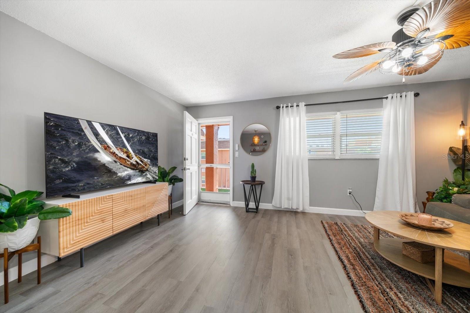 Tastefully decorated and updated with newer LVP flooring and trendy paint colors.