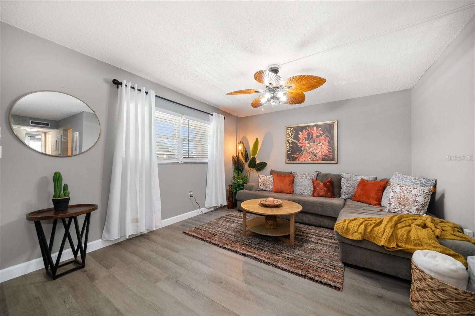 Unwind and relax after a long day playing at the beach in the cozy living space.