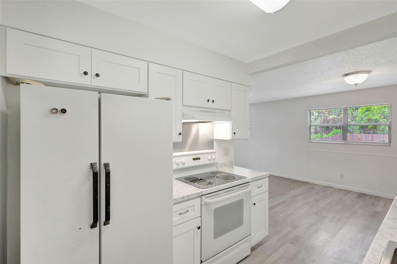 Kitchen opens to Dining Area!