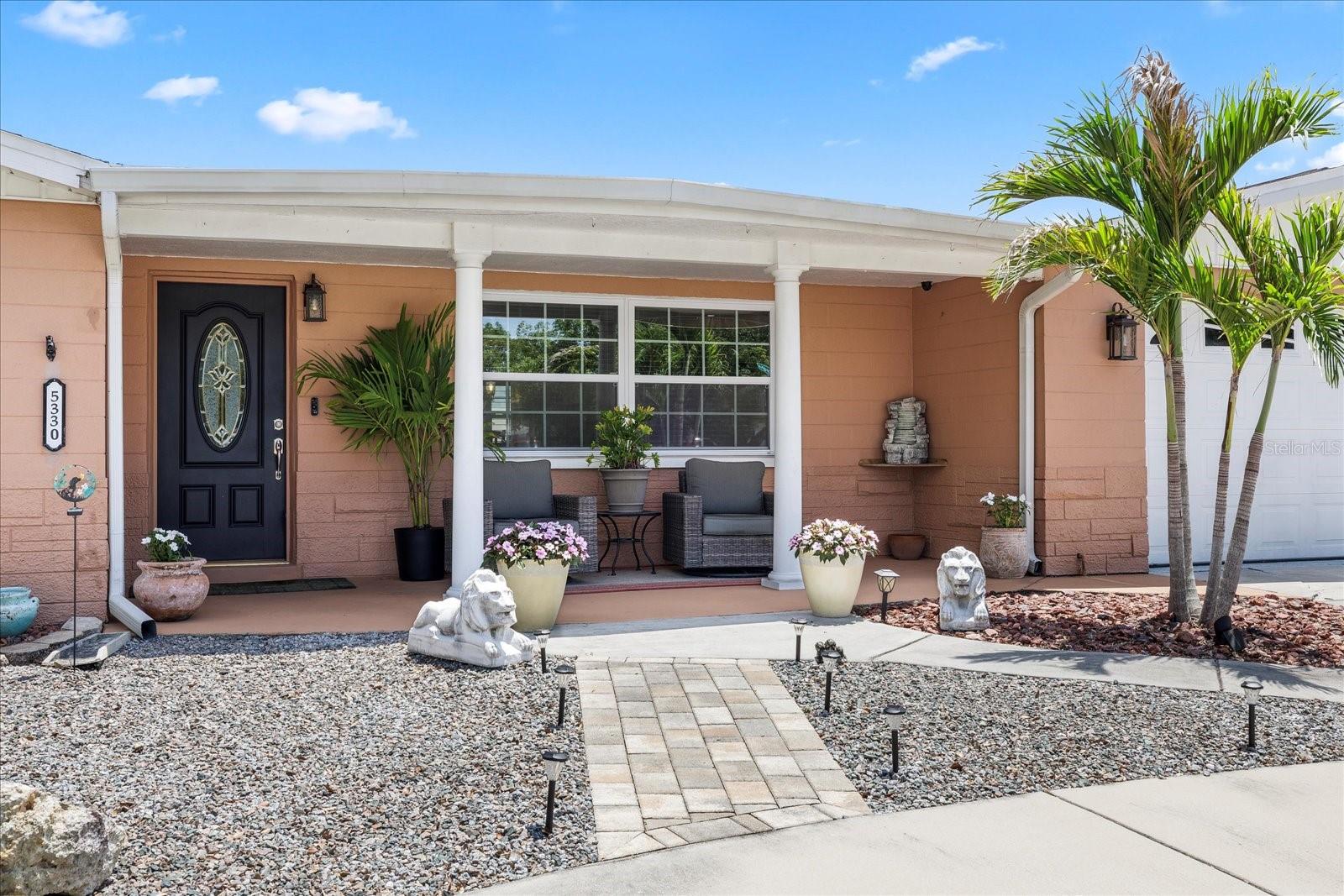 Nice landscaped front porch area