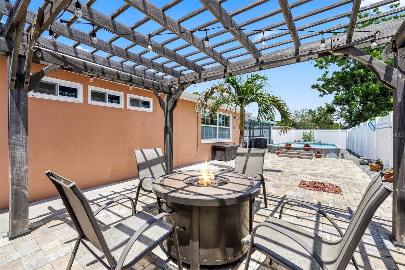 Fire pit under pergola