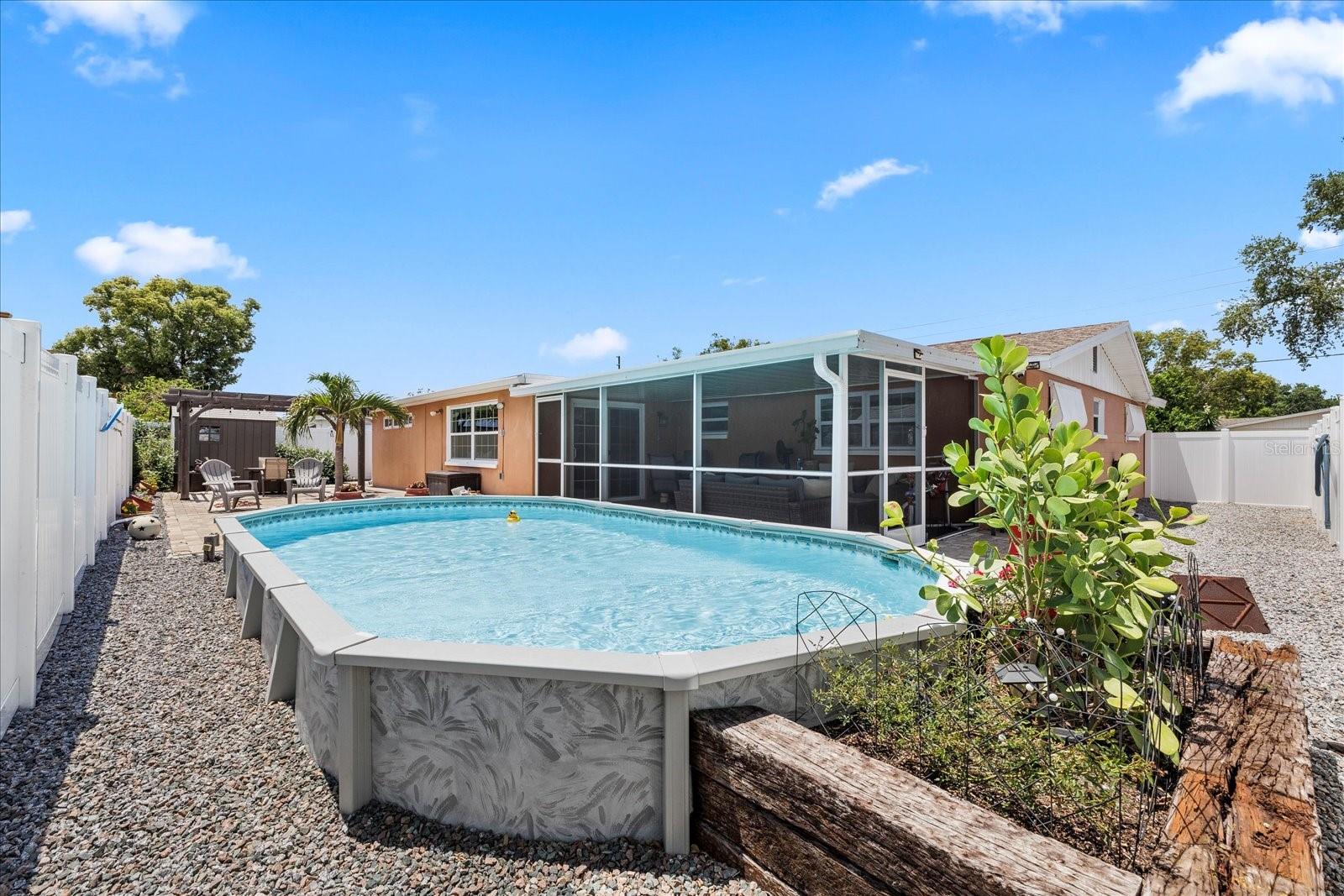 Backyard fenced pool area