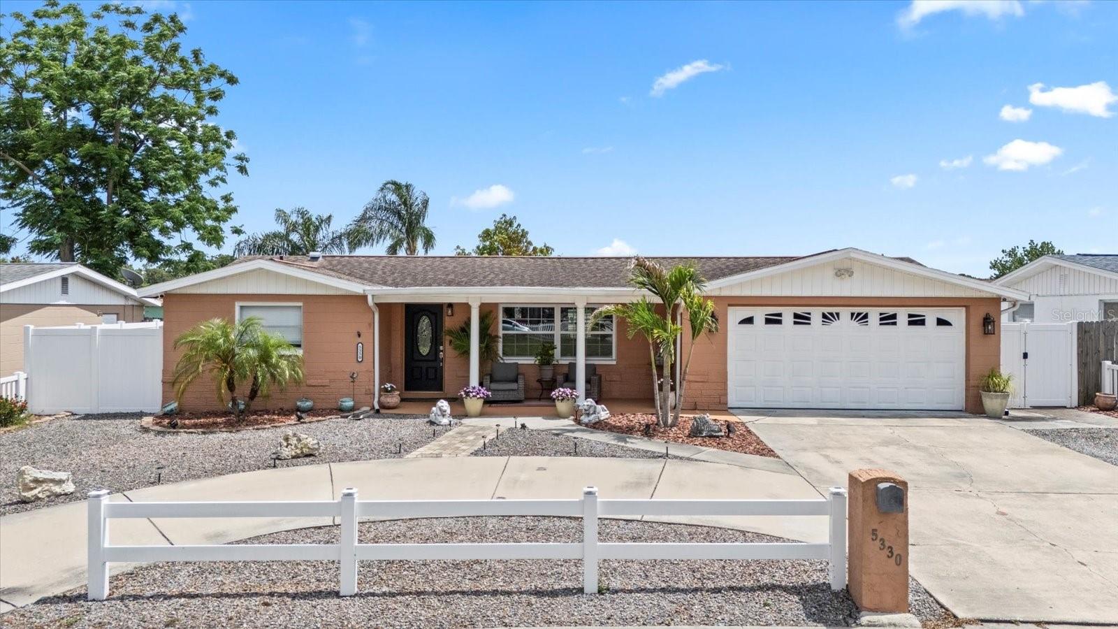 Maintenance free landscaping and large driveway