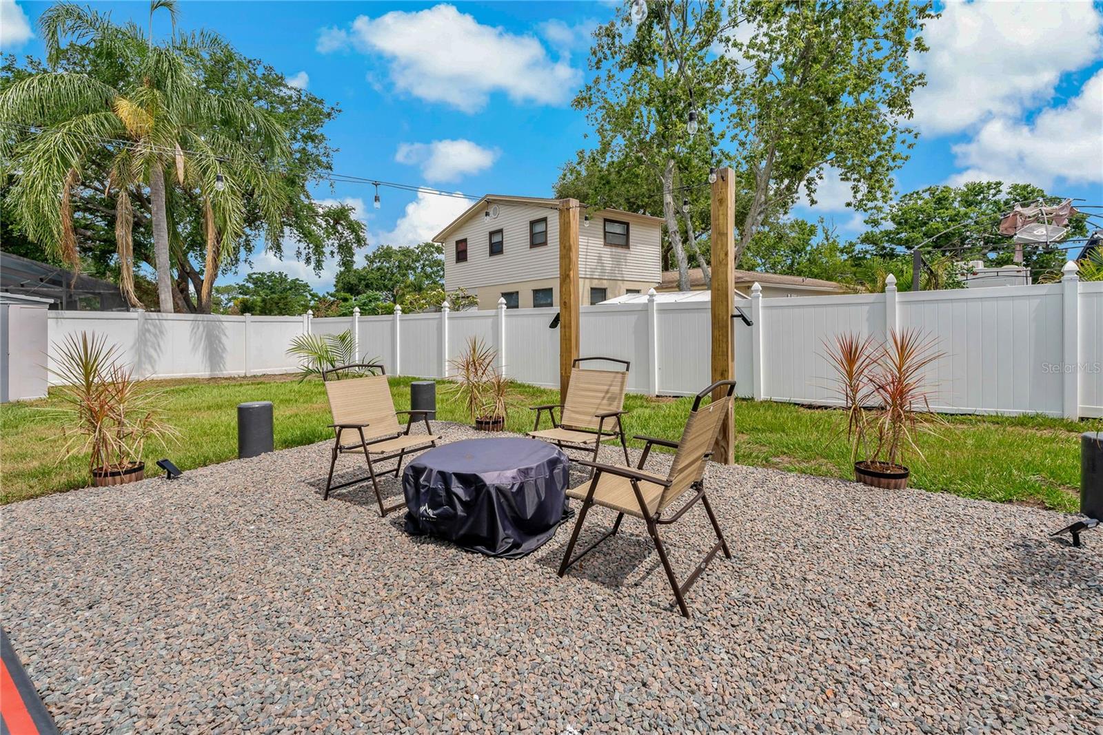 FULLY FENCED IN BACKYARD ~ BEAUTIFUL WHITE VINYL FENCING