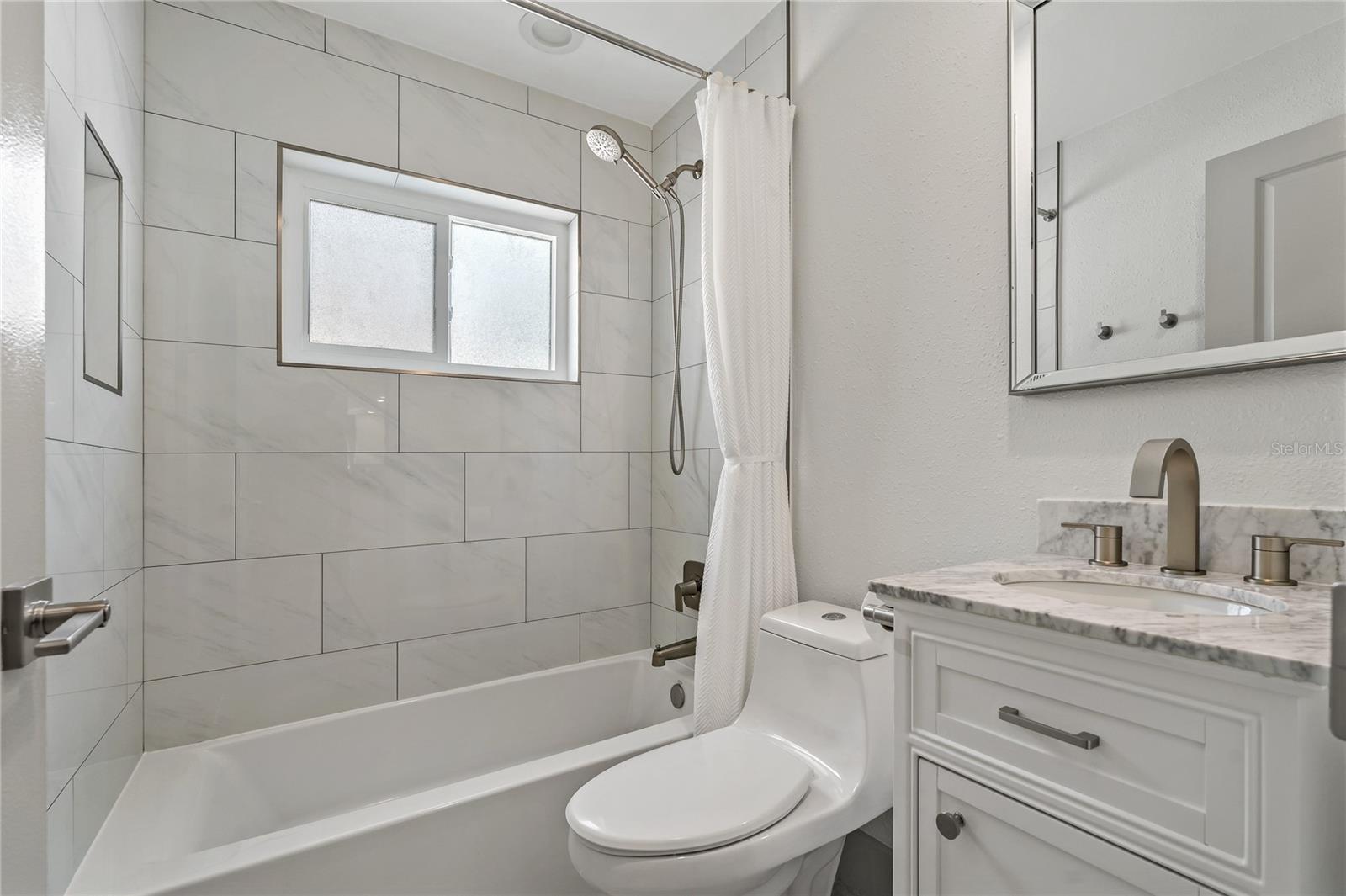BEAUTIFULLY APPOINTED GUEST BATHROOM