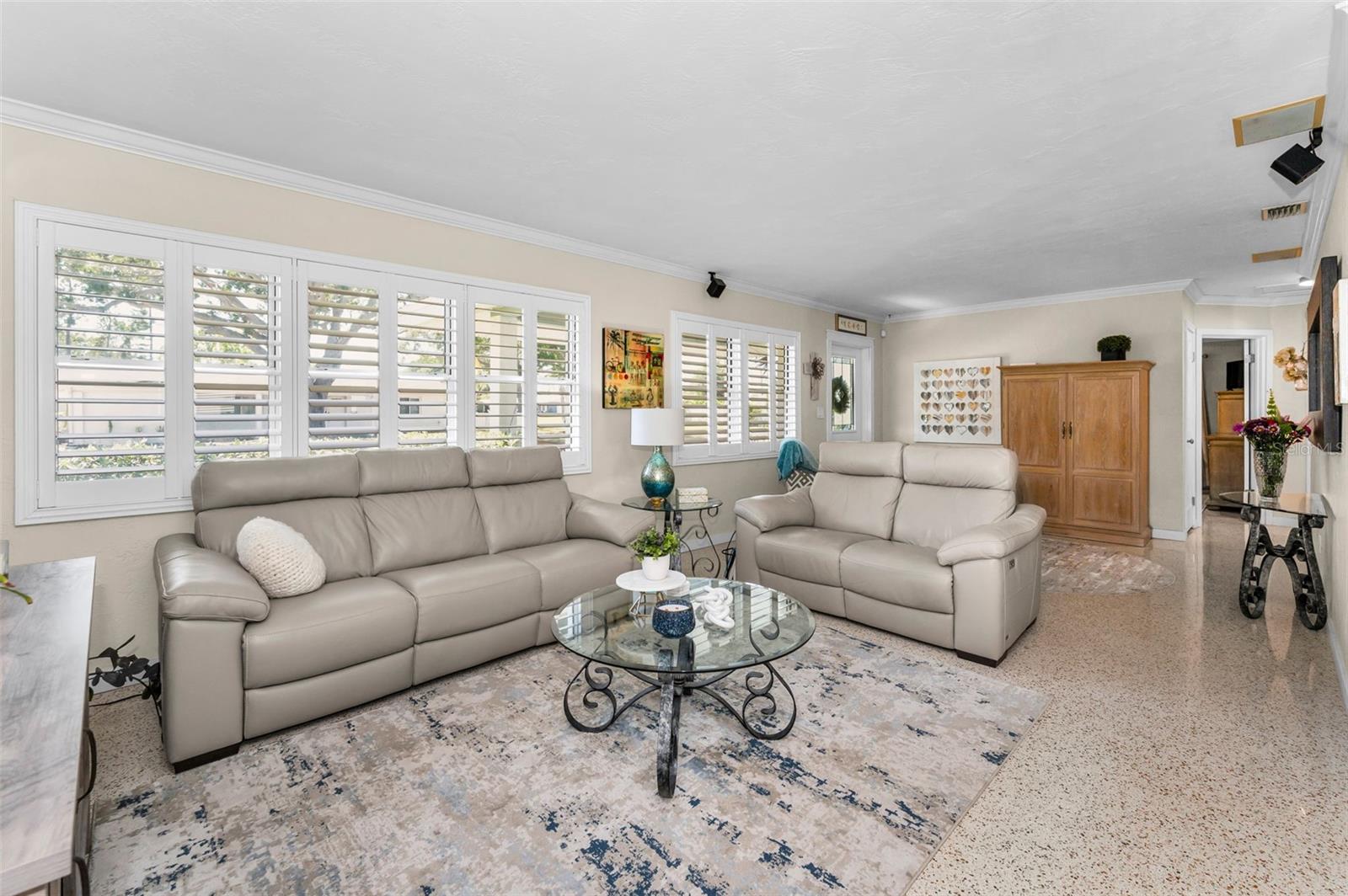 The Living Room has natural light galore pouring in through the windows leaving this spacious room light and bright!